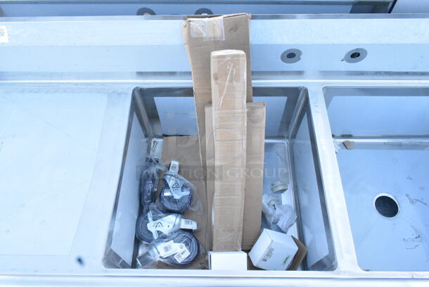 BRAND NEW SCRATCH AND DENT! Regency 600S22424224 98" 16 Gauge Stainless Steel Two Compartment Commercial Sink with Stainless Steel Legs, Cross Bracing, and 2 Drainboards - 24" x 24" x 14" Bowls. No Legs. - Image 5 of 6