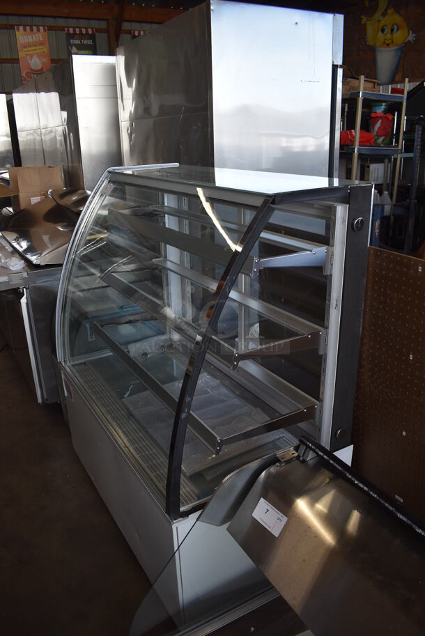 BRAND NEW SCRATCH AND DENT! Avantco 193BCTD48W Stainless Steel Commercial Floor Style 3-Shelf Curved Glass Dry Bakery Display Case w/ LED Lighting on Commercial Casters. 110-120 Volts, 1 Phase. Tested and Working! - Image 2 of 7