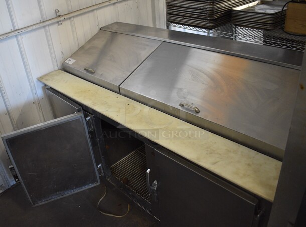 Stainless Steel Commercial Sandwich Salad Prep Table Bain Marie Mega Top on Commercial Casters. Middle Door Does Not Stay Closed. 115 Volts, 1 Phase. 72x32x45. Tested and Powers On But Does Not Get Cold