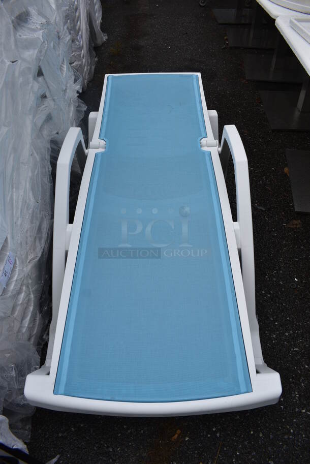 5 BRAND NEW SCRATCH AND DENT! Lancaster Table & Seating White Stacking Adjustable Chaise with Marine Blue Sling Seat. 72x28x19. 5 Times Your Bid! - Image 4 of 5