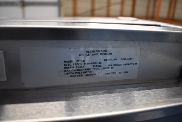Delfield 6176-S Stainless Steel Commercial 3 Door Reach In Cooler on Commercial Casters. 115 Volts, 1 Phase. 76x32.5x80. Tested and Does Not Power On - Image 7 of 7