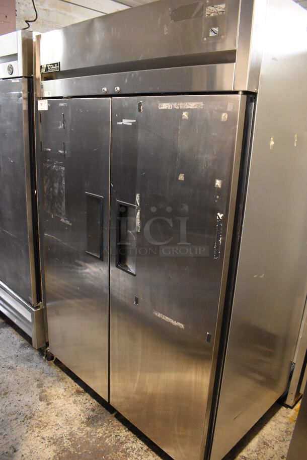 True TG2R-2S ENERGY STAR Stainless Steel Commercial 2 Door Reach In Cooler w/ Poly Coated Racks on Commercial Casters. 115 Volts, 1 Phase. Cannot Test - Unit Trips Breaker
