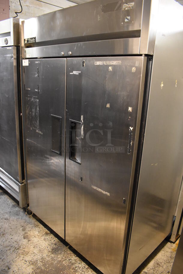 True TG2R-2S ENERGY STAR Stainless Steel Commercial 2 Door Reach In Cooler w/ Poly Coated Racks on Commercial Casters. 115 Volts, 1 Phase. Cannot Test - Unit Trips Breaker - Image 1 of 7