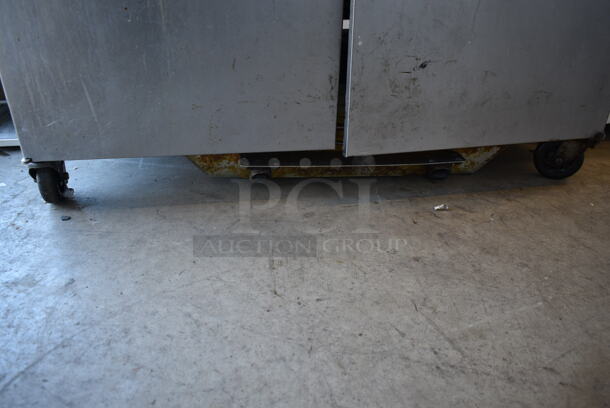 2015 Henny Penny OFG-342 Stainless Steel Commercial Floor Style Natural Gas Powered 2 Bay Deep Fat Fryer w/ Filtration System on Commercial Casters. 240,000 BTU.  - Image 9 of 11