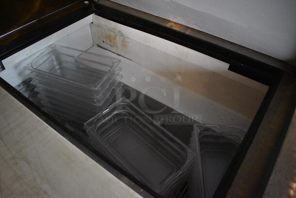 2011 True TSSU-72-30M-B-ST Stainless Steel Commercial Pizza Prep Table on Commercial Casters. BUYER MUST REMOVE. 115 Volts, 1 Phase. 72x34x38. Item Was in Working Condition on Last Day of Business. (Susquehanna Ale House) - Image 4 of 8
