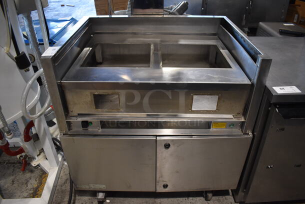 CookTek Stainless Steel Commercial Countertop Frame For Induction Range on Electrolux Model ELP/SUSA Stainless Steel Vent Cabinet on Commercial Casters. 208-250 Volts. 35x28x36