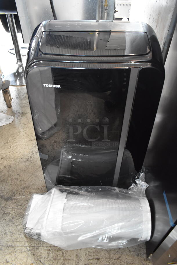BRAND NEW SCRATCH AND DENT! Toshiba RAC-PD1412CRU 14,000 BTU 115-Volt Portable AC with Dehumidifier Function. 115 Volts, 1 Phase. Tested and Working! - Image 1 of 7