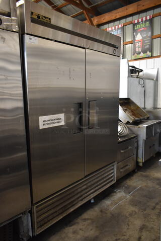 True T-49 Stainless Steel Commercial 2 Door Reach In Cooler on Commercial Casters. 115 Volts, 1 Phase. Tested and Working!
