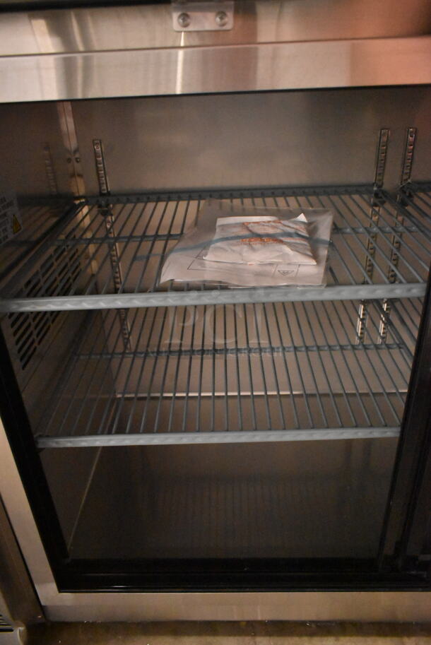 BRAND NEW SCRATCH AND DENT! Avantco 178UBB60SHCS 60" Stainless Steel Counter Height Narrow Sliding Glass Door Back Bar Refrigerator with LED Lighting. See Pictures for Broken Door Glass. 115 Volts, 1 Phase. Tested and Working! - Image 6 of 7