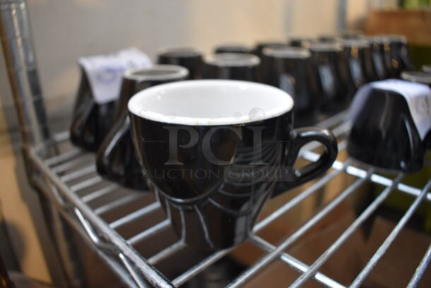 15 Black and White Ceramic Mugs. 4.25x3.25x3. 15 Times Your Bid!