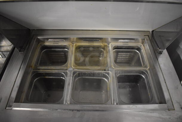 Everest EPBNR1 Stainless Steel Commercial Sandwich Salad Prep Table Bain Marie Mega Top on Commercial Casters. 115 Volts, 1 Phase. 28x30x45. Tested and Powers On But Does Not Get Cold - Image 4 of 6