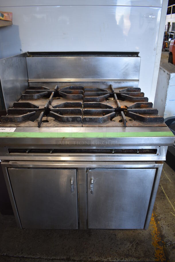 Stainless Steel Commercial Natural Gas Powered 4 Burner Range w/ Backsplash, Left Splash Guard and 2 Doors. 36x37x49