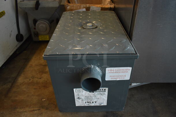 BRAND NEW SCRATCH AND DENT! Watts Model WD-4 Metal Commercial Grease Trap. 10x18x11 - Image 1 of 6