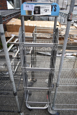 Gray Metal 4 Tier Rack on Casters. 