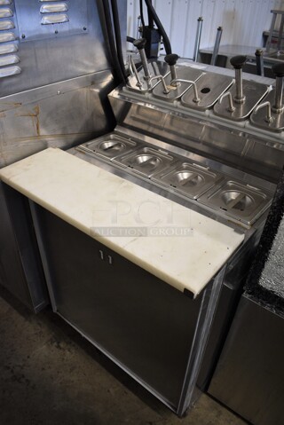 Silver King SKF2A Stainless Steel Commercial Prep Table w/ 5 Drop In Pump Lids and 4 1/6 Size Drop Ins on Commercial Casters. 115 Volts, 1 Phase. 27x31x44. Tested and Working!