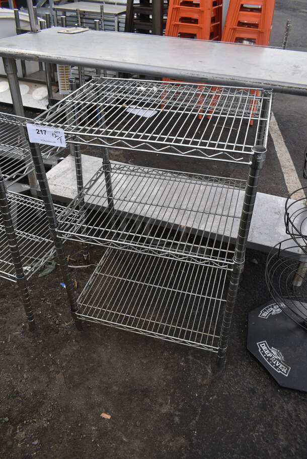 Chrome Finish 3 Tier Wire Shelving Unit. BUYER MUST DISMANTLE. PCI CANNOT DISMANTLE FOR SHIPPING. PLEASE CONSIDER FREIGHT CHARGES. - Image 1 of 2