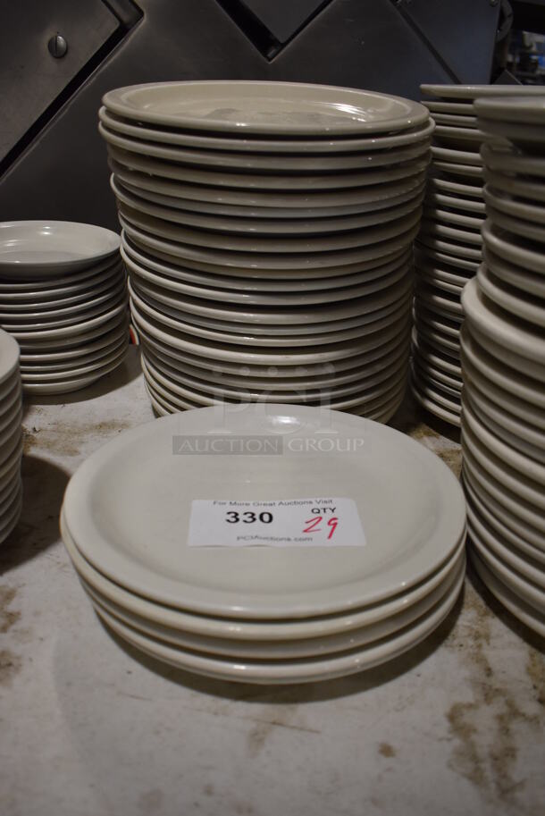 29 White Ceramic Plates. 10x10x1. 29 Times Your Bid!