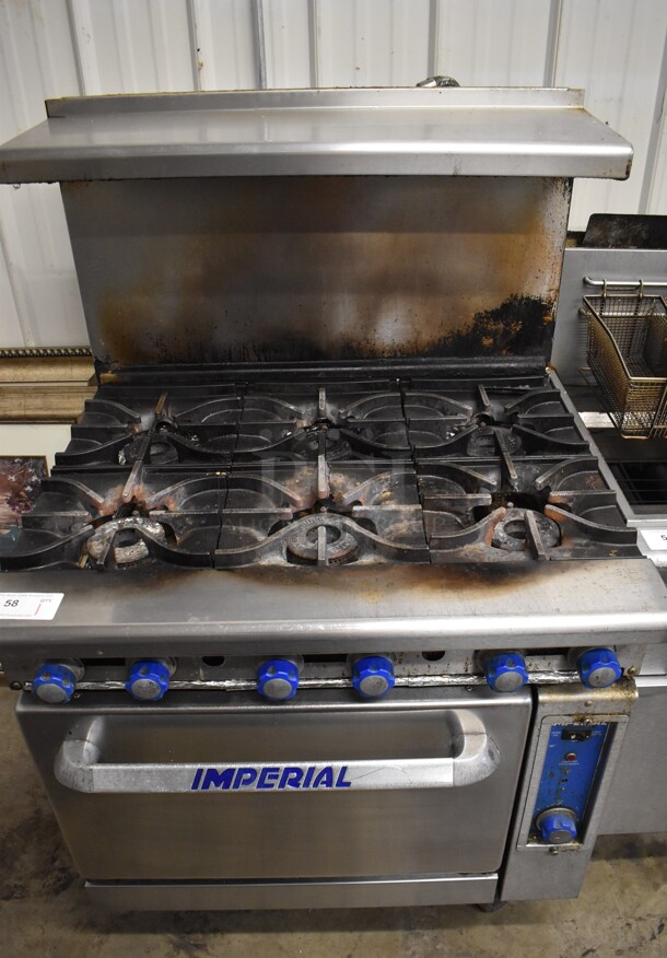 Imperial Stainless Steel Commercial Natural Gas Powered 6 Burner Range w/ Convection Oven, Over Shelf and Back Splash on Commercial Casters. 36x32x56
