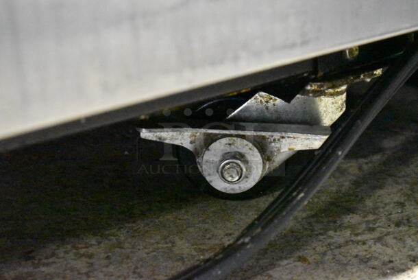 2011 True TG2R-2S ENERGY STAR Stainless Steel Commercial 2 Door Reach In Cooler w/ Poly Coated Racks on Commercial Casters. 115 Volts, 1 Phase. Tested and Working! - Image 4 of 8