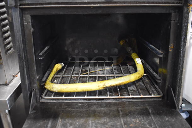 Garland Metal Commercial Natural Gas Powered 4 Burner Range w/ Oven, Over Shelf and Back Splash. - Image 3 of 3