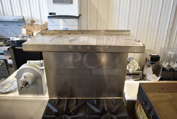 Garland SunFire X24-4L Stainless Steel Commercial Natural Gas Powered 4 Burner Range w/ Oven, Over Shelf and Back Splash. - Image 3 of 9