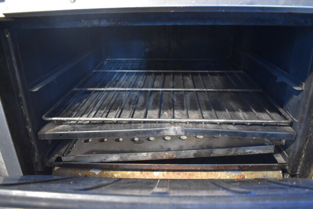 Vulcan GH45 Stainless Steel Commercial Propane Gas Powered 4 Burner Range w/ Oven on Commercial Casters. 50,000 BTU. 36x38x43 - Image 6 of 7