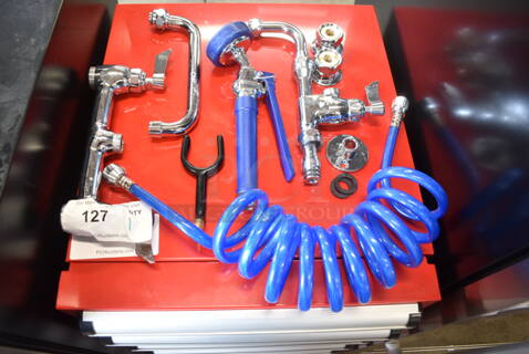 BRAND NEW SCRATCH AND DENT! Faucet, Handles and Spray Nozzle. 