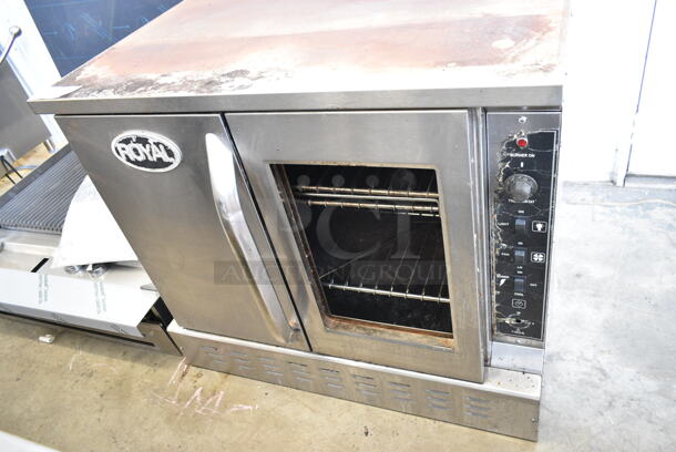 Royal Stainless Steel Commercial Gas Powered Full Size Convection Oven w/ Solid Door, View Through Door, Metal Oven Racks and Thermostatic Controls. See Pictures for Broken Glass Door.  - Image 1 of 5