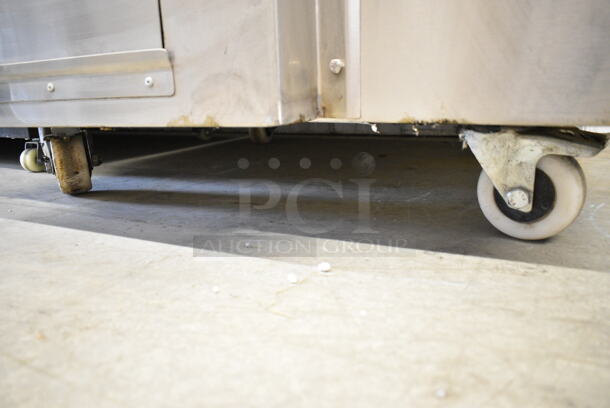 BRAND NEW SCRATCH AND DENT! Morni Stainless Steel Commercial Natural Gas Powered Tandoori Tandoor Oven on Commercial Casters.  - Image 5 of 7