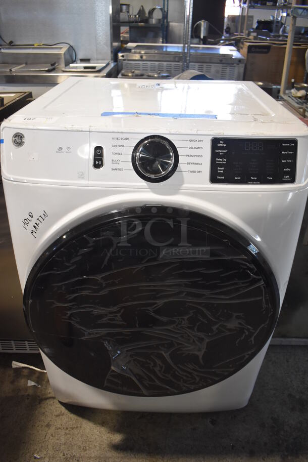 BRAND NEW SCRATCH AND DENT! GE GFD55ESSN1WW Metal Front Load Dryer. 120/208/240 Volts, 1 Phase. 28x32x39.5