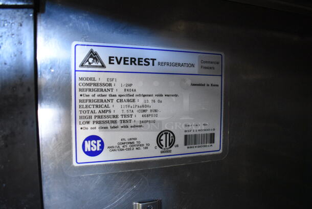 Everest ESF1 Stainless Steel Commercial Single Door Reach In Freezer w/ Poly Coated Racks on Commercial Casters. 115 Volts, 1 Phase. Tested and Powers On But Does Not Get Cold - Image 4 of 4