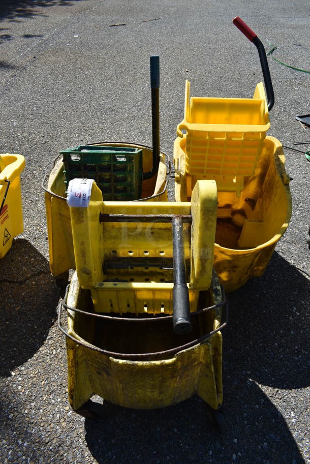 3 Various Yellow Mop Buckets w/ 3 Wringing Attachment. Includes 15x20x18. 3 Times Your Bid!