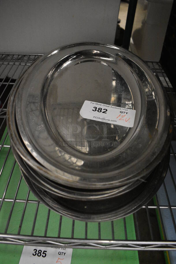 12 Various Metal Oval Trays. Includes 18x11.5x1. 12 Times Your Bid!
