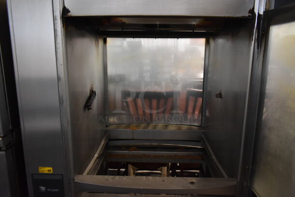 Fri-jado STG7-P Stainless Steel Commercial Electric Powered Rotisserie Oven w/ Under Shelf on Commercial Casters. 208 Volts, 3 Phase.
 - Image 4 of 9