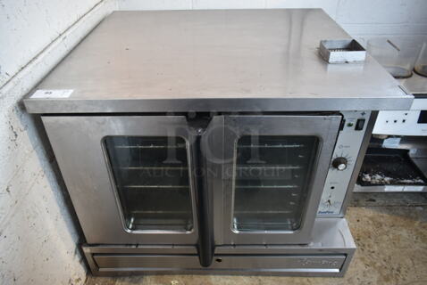 Garland SunFire Stainless Steel Commercial Countertop Natural Gas Powered Full Size Convection Oven w/ View Through Doors, Metal Oven Racks and Thermostatic Controls.