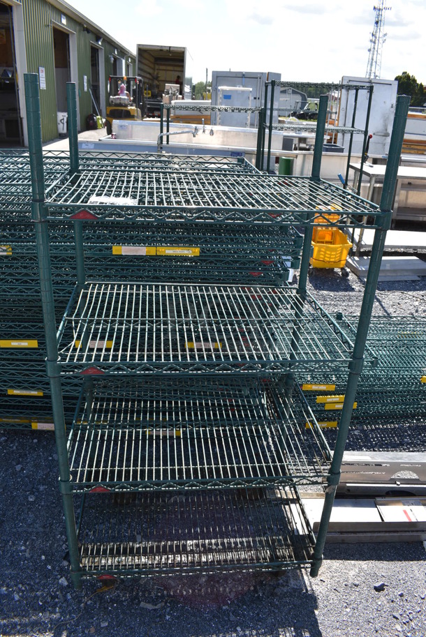 Metro Green Finish 4 Tier Shelving Unit on Commercial Casters. BUYER MUST DISMANTLE. PCI CANNOT DISMANTLE FOR SHIPPING. PLEASE CONSIDER FREIGHT CHARGES. 30x21x58