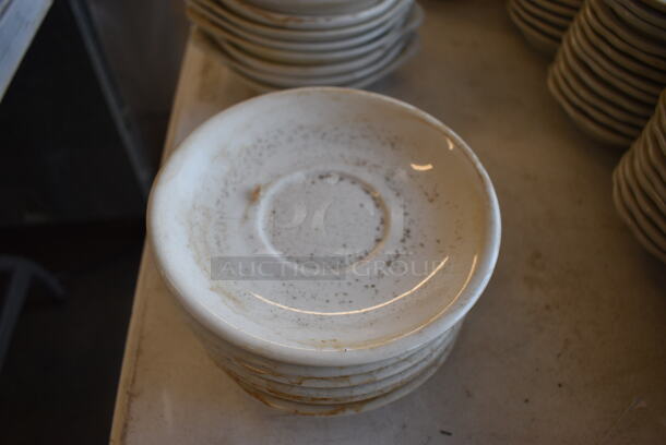 9 White Ceramic Saucers. 6x6x1. 9 Times Your Bid!