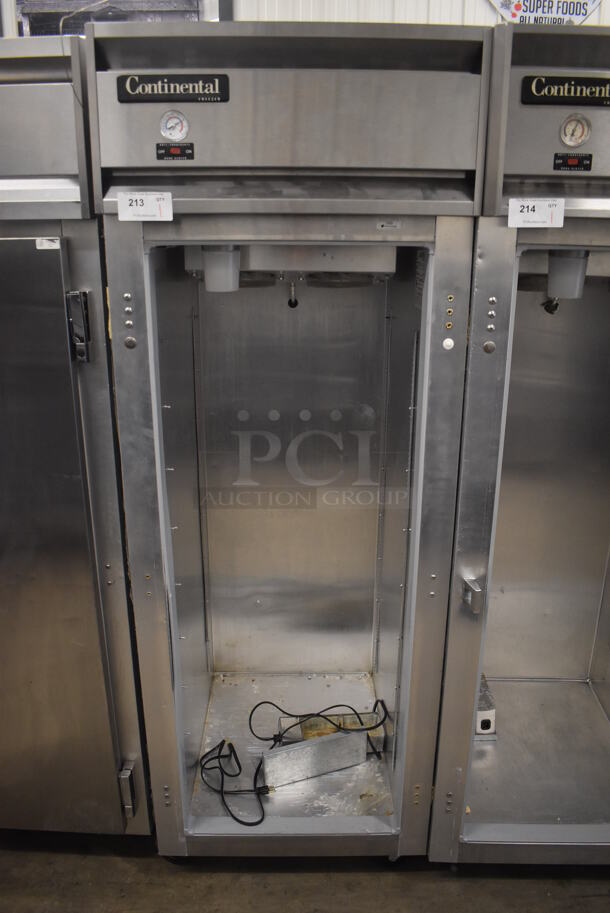 Continental 1FE Stainless Steel Commercial Single Door Reach In Freezer on Commercial Casters. Missing Door. 115 Volts, 1 Phase. 28.5x36x77.5. Tested and Powers On But Temps at 46 Degrees - Image 1 of 6