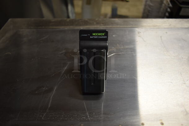 Neewer Battery Charger and Battery - Image 1 of 4