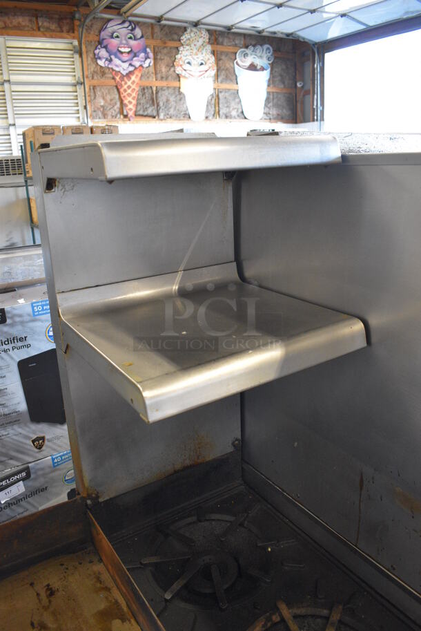 Vulcan GH60T45 Stainless Steel Commercial Natural Gas Powered 2 Burner Range w/ Flat Top Griddle, Oven and 2 Over Shelves on Commercial Casters. 34x40x72 - Image 4 of 9