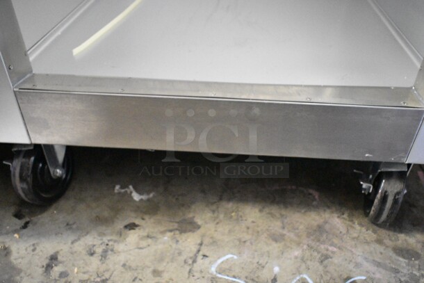 BRAND NEW! 2023 Traulsen G10010 Stainless Steel Commercial Single Door Reach In Cooler w/ Poly Coated Racks on Commercial Casters. 115 Volts, 1 Phase. Tested and Working! - Image 3 of 5