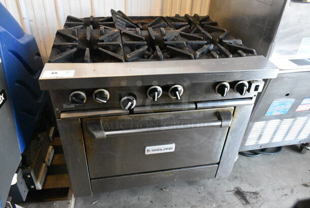 2021 Garland G36-6C Stainless Steel Commercial Natural Gas Powered 6 Burner Range w/ Oven.  - Image 1 of 6
