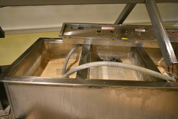 Buffet Station w/ 2 Steam Table Inserts and Sneeze Guard. BUYER MUST REMOVE: Bring Tools and Manpower Needed To Remove This Item. This Unit Was In Working Condition When the Restaurant Closed. (main dining room) - Image 6 of 9