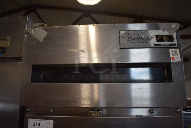 Delfield Stainless Steel Commercial Two Half Size Door Reach In Freezer on Commercial Casters. 115 Volts, 1 Phase. 25.5x32x80. Tested and Working! - Image 2 of 6