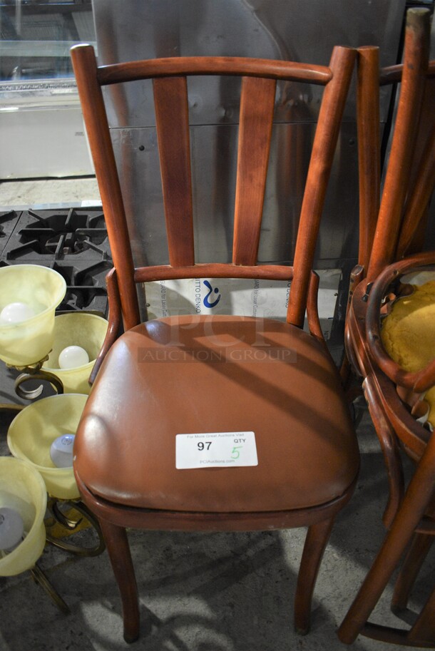 5 Wooden Dining Chairs w/ Brown Seat Cushion. Stock Picture - Cosmetic Condition May Vary. 17x17x35. 5 Times Your Bid!