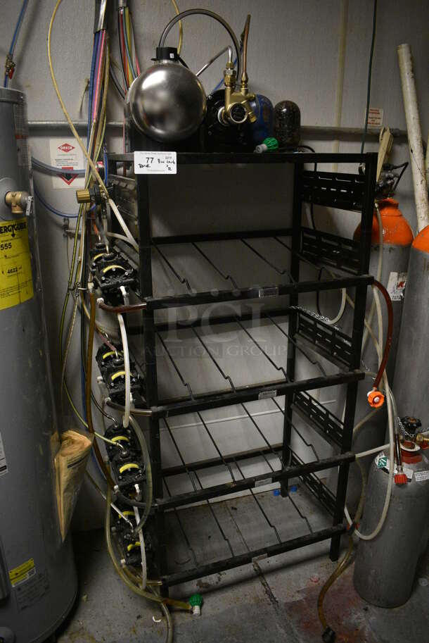 Black Metal Soda Rack w/ 8 Soda Pumps and Carbonator. BUYER MUST REMOVE. 30x19.5x57.5. (kitchen) - Image 1 of 5