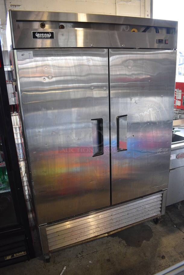 Bison Model MBF8507 Stainless Steel Commercial 2 Door Reach In Cooler w/ Poly Coated Racks on Commercial Casters. 115 Volts, 1 Phase. 54x32x83.5. Tested and Working! - Image 1 of 6