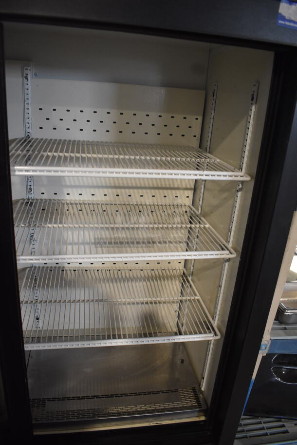 QBD CD4154SL Commercial Reach In Cooler in Black With Glass Sliding Doors and Polycoated Racks on Commercial Casters. 115V/1 Phase Tested And Working - Image 5 of 7