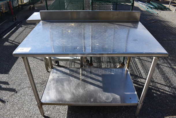Stainless Steel Table w/ Back Splash and Under Shelf. 46x30x40