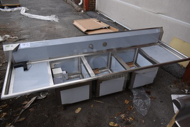 BRAND NEW SCRATCH AND DENT! Regency 600IB1824S31620218 Stainless Steel Commercial 3 Bay Sink w/ Dual Drain Boards. No Legs. Bays 16x20. Drain Boards 16x22 - Image 1 of 5